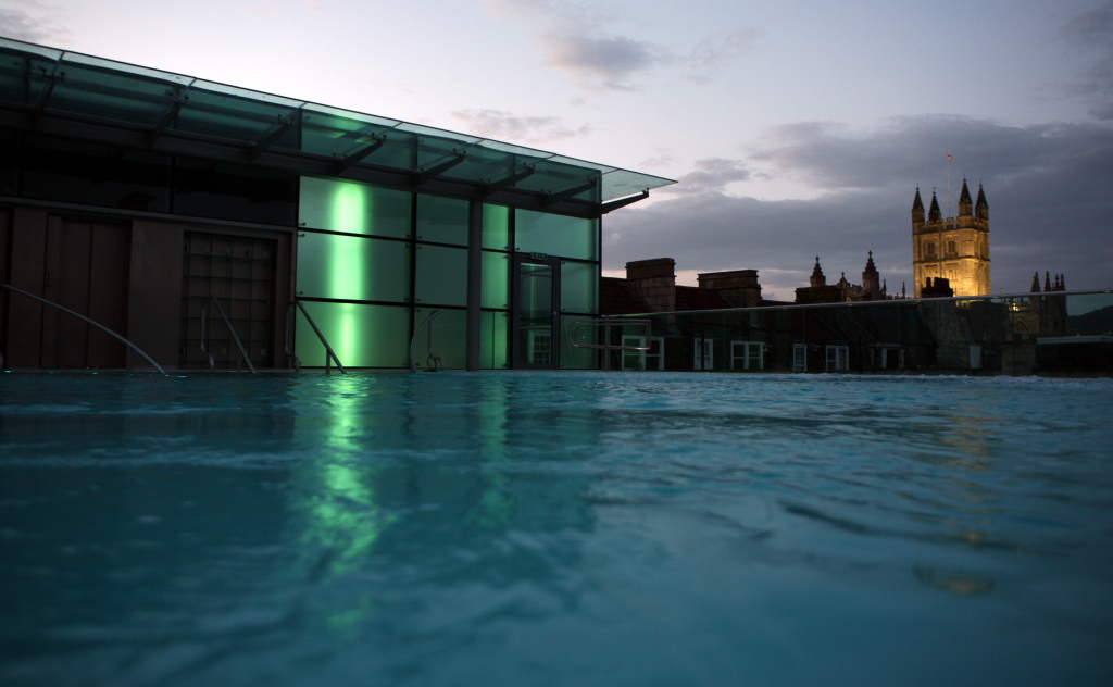 Thermae Bath Spa Rooftop pool at dusk