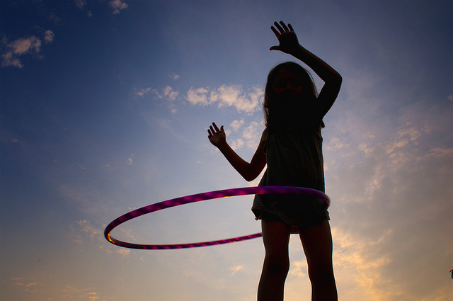 girl hula hooping Bin the gym: 5 alternative ways to exercise after work