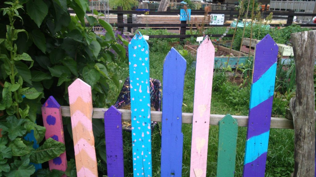 brightly painted fences at Stepney City Farm 