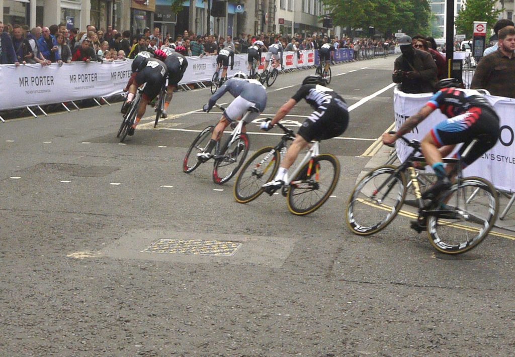 teams of cyclists on the first lap of London Nocturne
