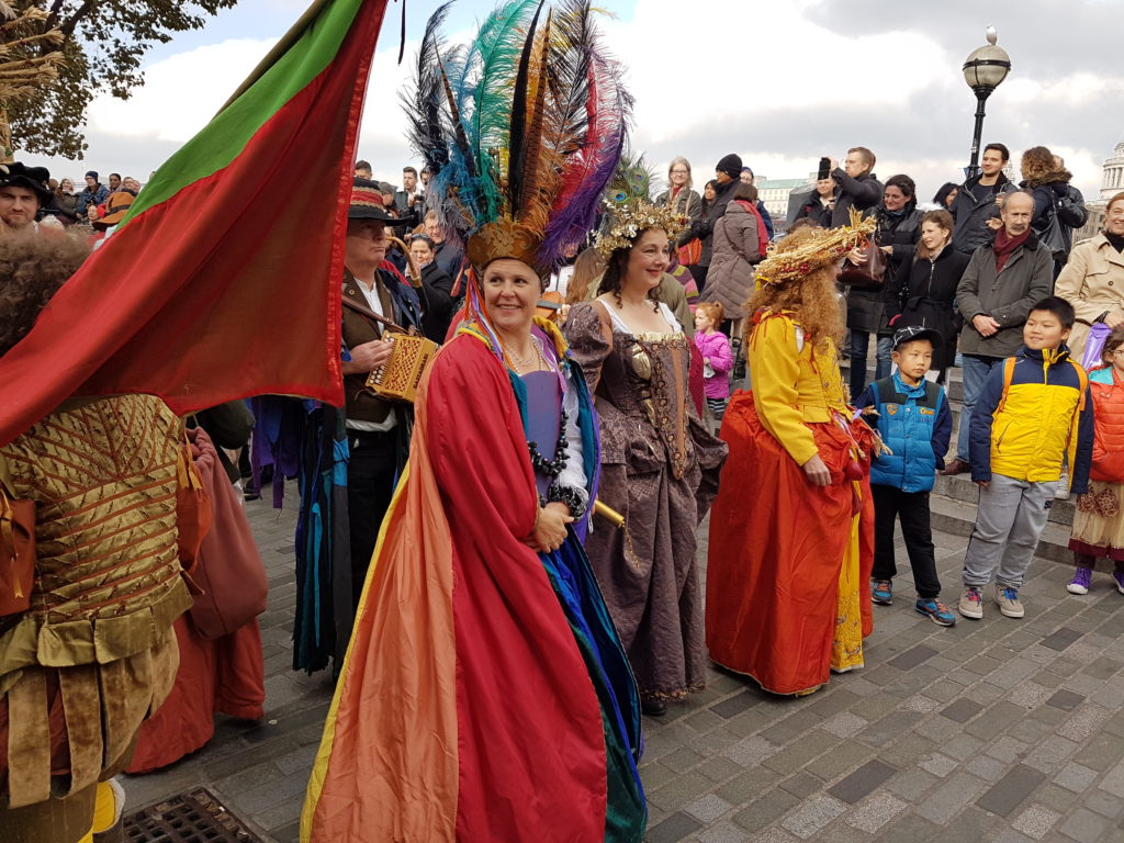 queens dressed in bright colours at the October Plenty autumn harvest festival 
