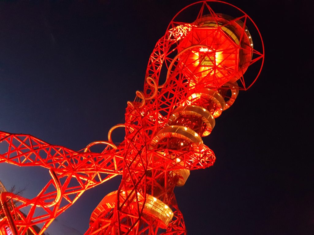 The ArcelorMittal orbit illuminated at night at the Queen Elizabeth Olympic Park