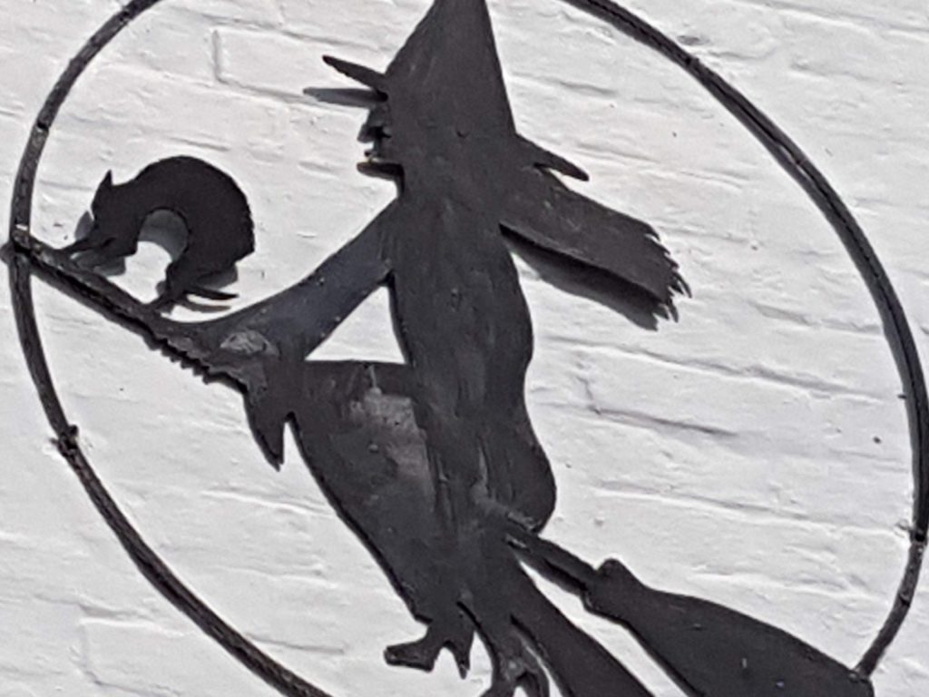 close up of witch emblem in Burley, New Forest 
