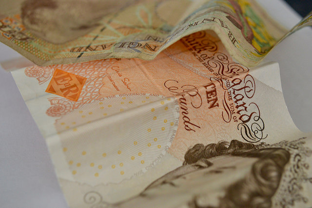 two folded ten pound notes