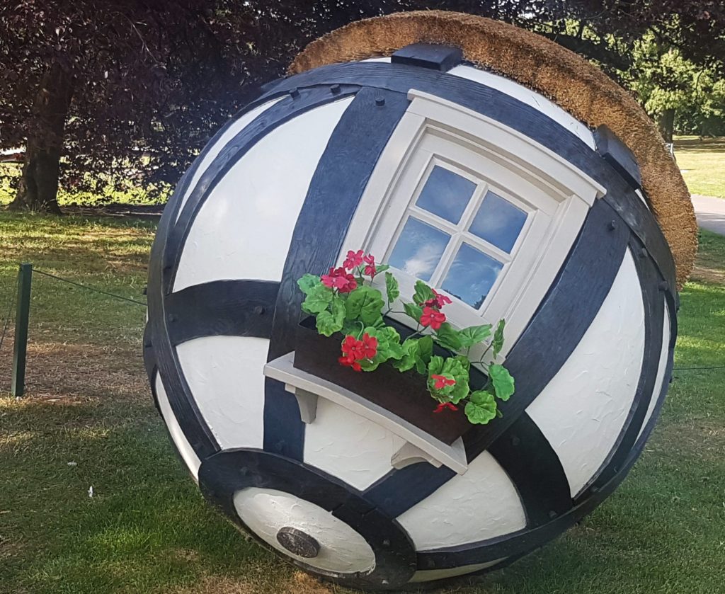 art sculpture of a house in a globe at Frieze Art Fair 