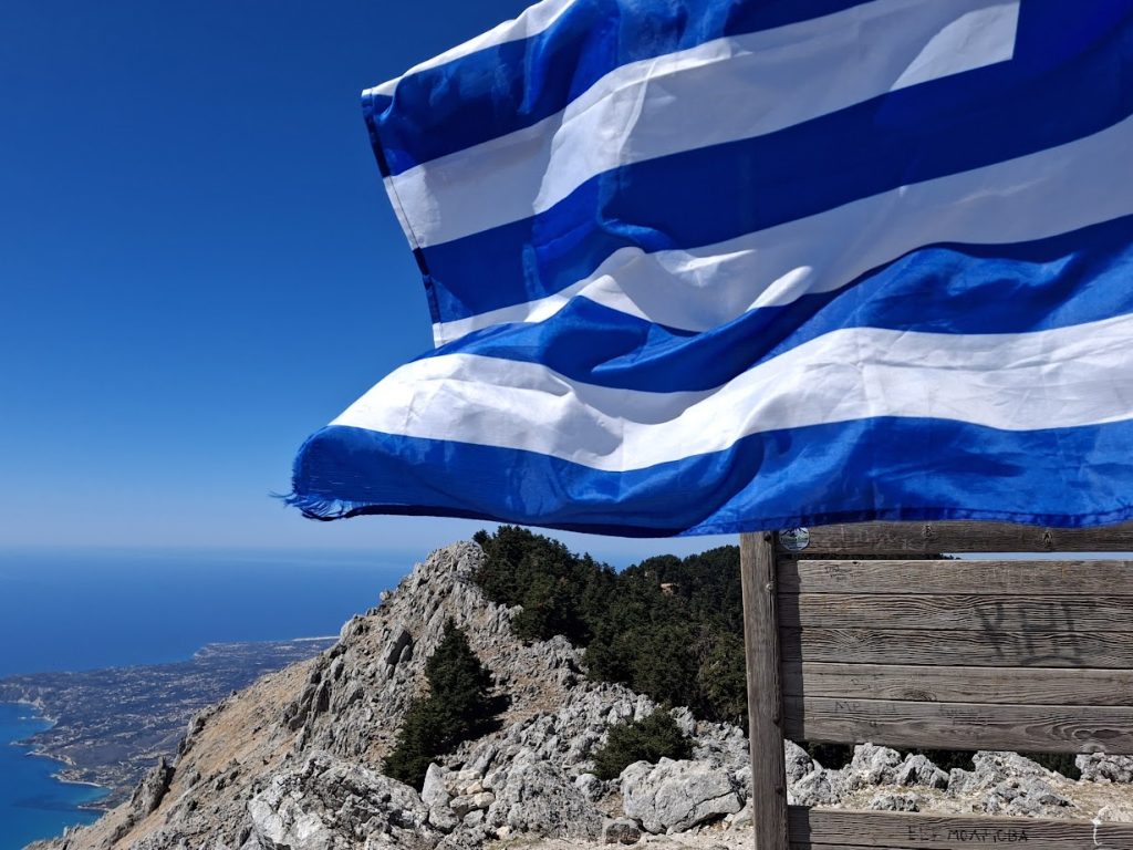 flag at the top of Mount Ainos in Kefalonia