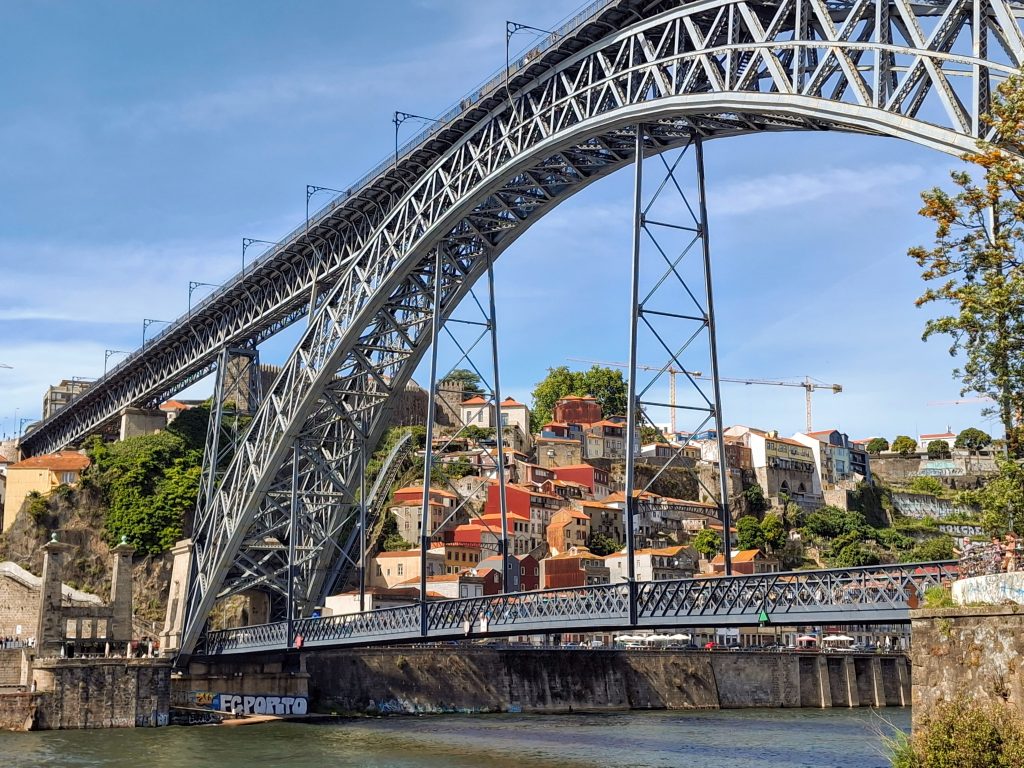 A close up of the upper and lower sections of the Dom Luis bridge in Porto